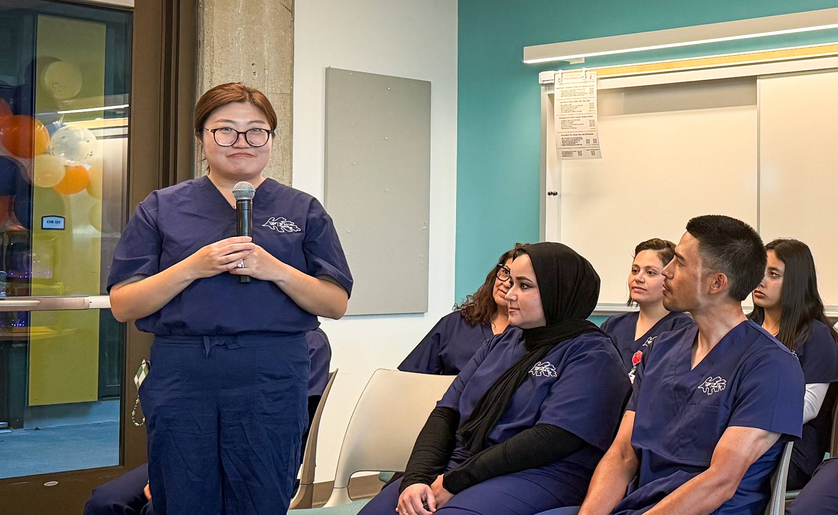 student speaking at health care pinning ceremony