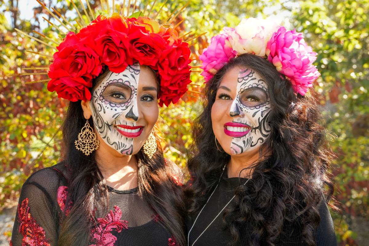 dia de los muertos - faculty with skull face paint and floral headbands