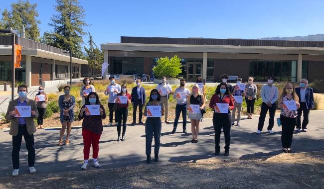 Students with their WIN Workshop certificates.