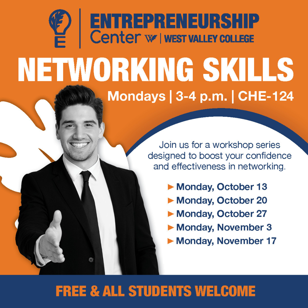 man with hand out for a handshake dressed in suit and tie