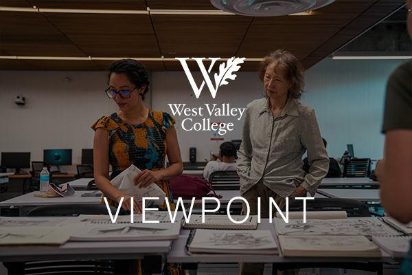 Two students working on a project on a table with WVC logo and Viewpoint text overlay