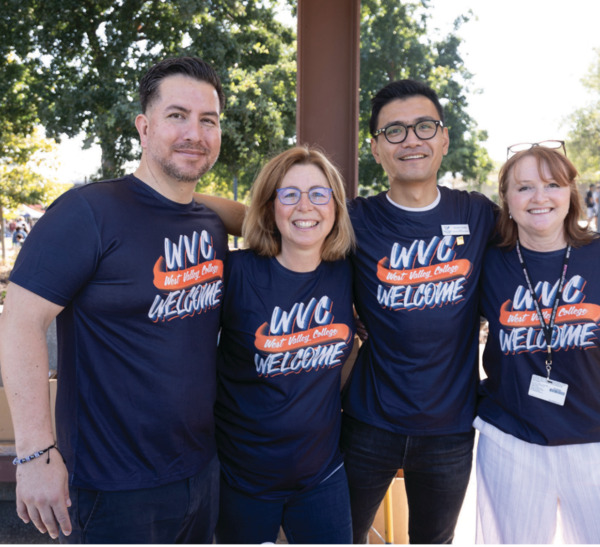 Four West Valley staff wearing matching shirts