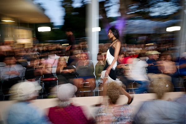 Student walking in fashion show