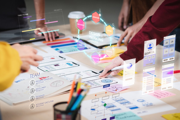 Digital workspace on table with humans